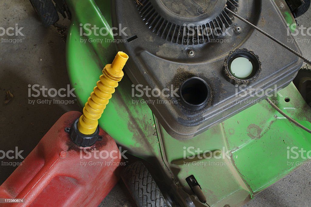 subject-a-lawn-mower-and-a-gas-tank-getting-ready-for-a-grass-mowing-session